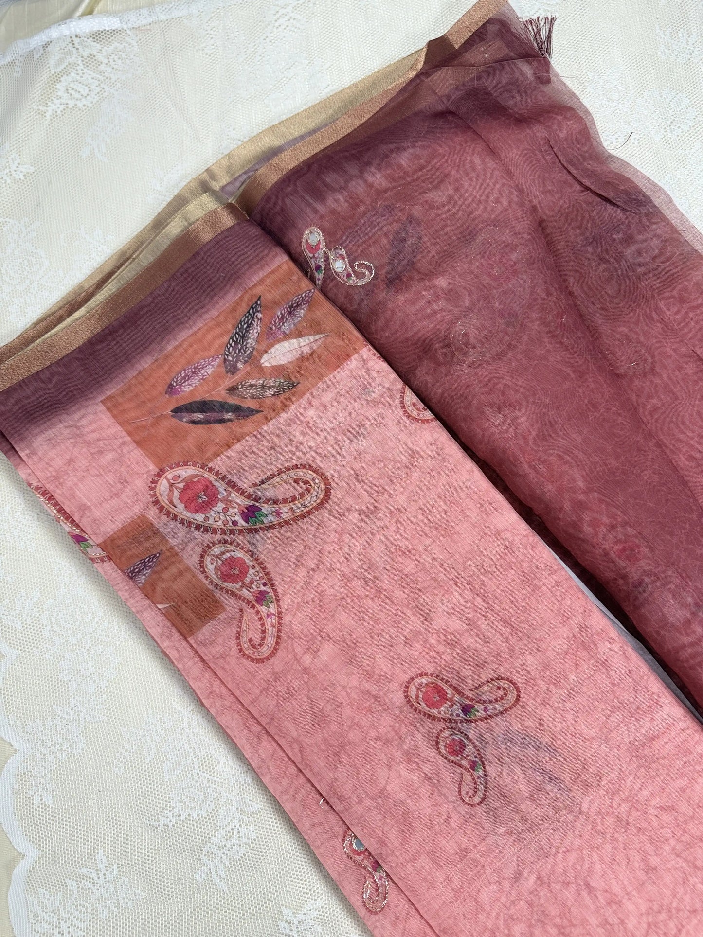 Metallic Orange Rose Silk Cotton Saree with Printed Leaves and Mango Motifs Bordered with Sequence Zari work and Mirror Work