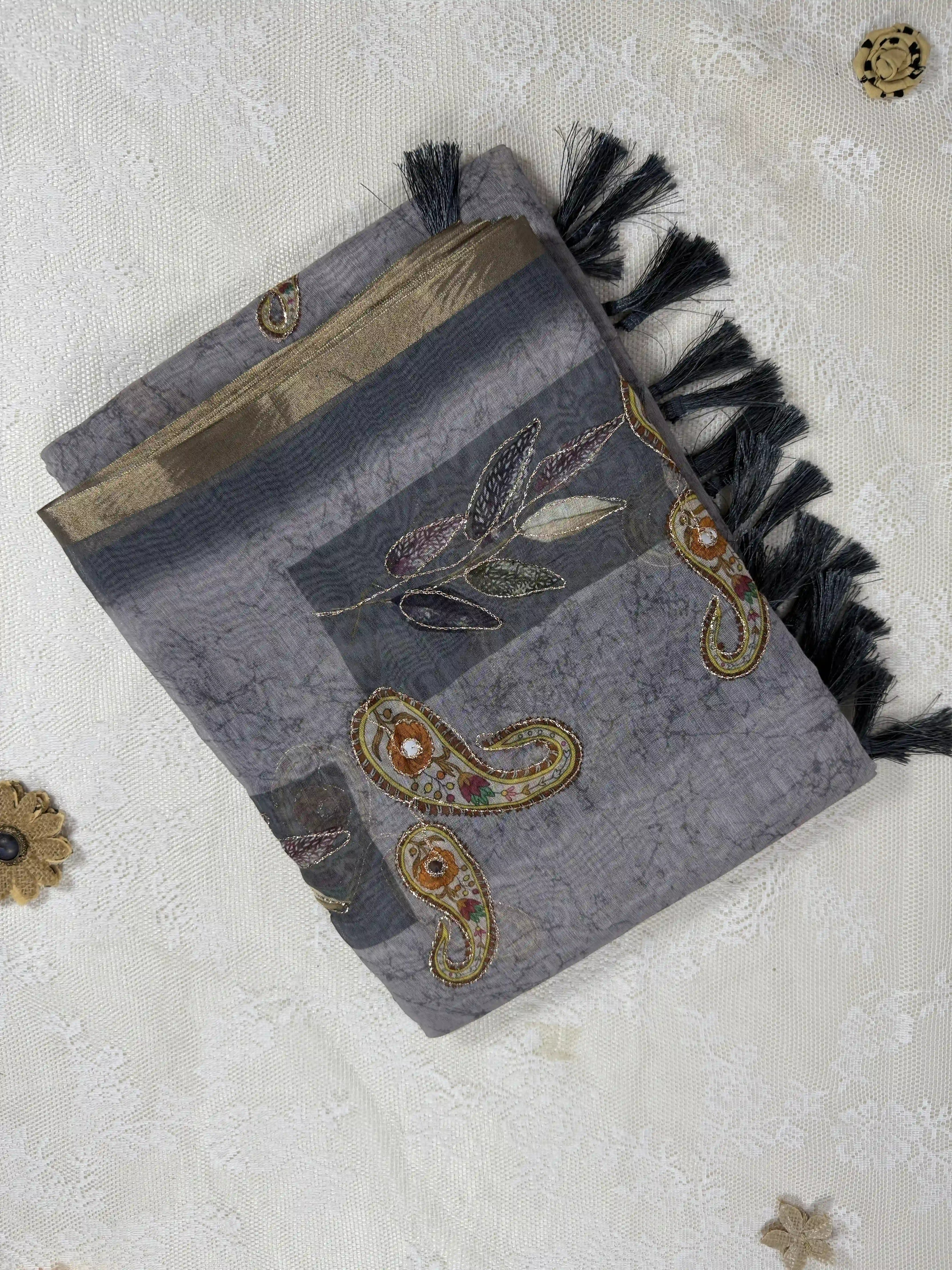 Metallic Grey Silk Cotton Saree with Printed Leaves and Mango Motifs Bordered with Sequence Zari work and Mirror Work