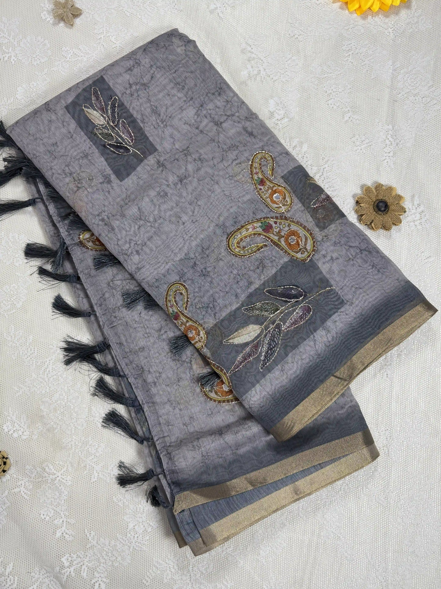 Metallic Grey Silk Cotton Saree with Printed Leaves and Mango Motifs Bordered with Sequence Zari work and Mirror Work
