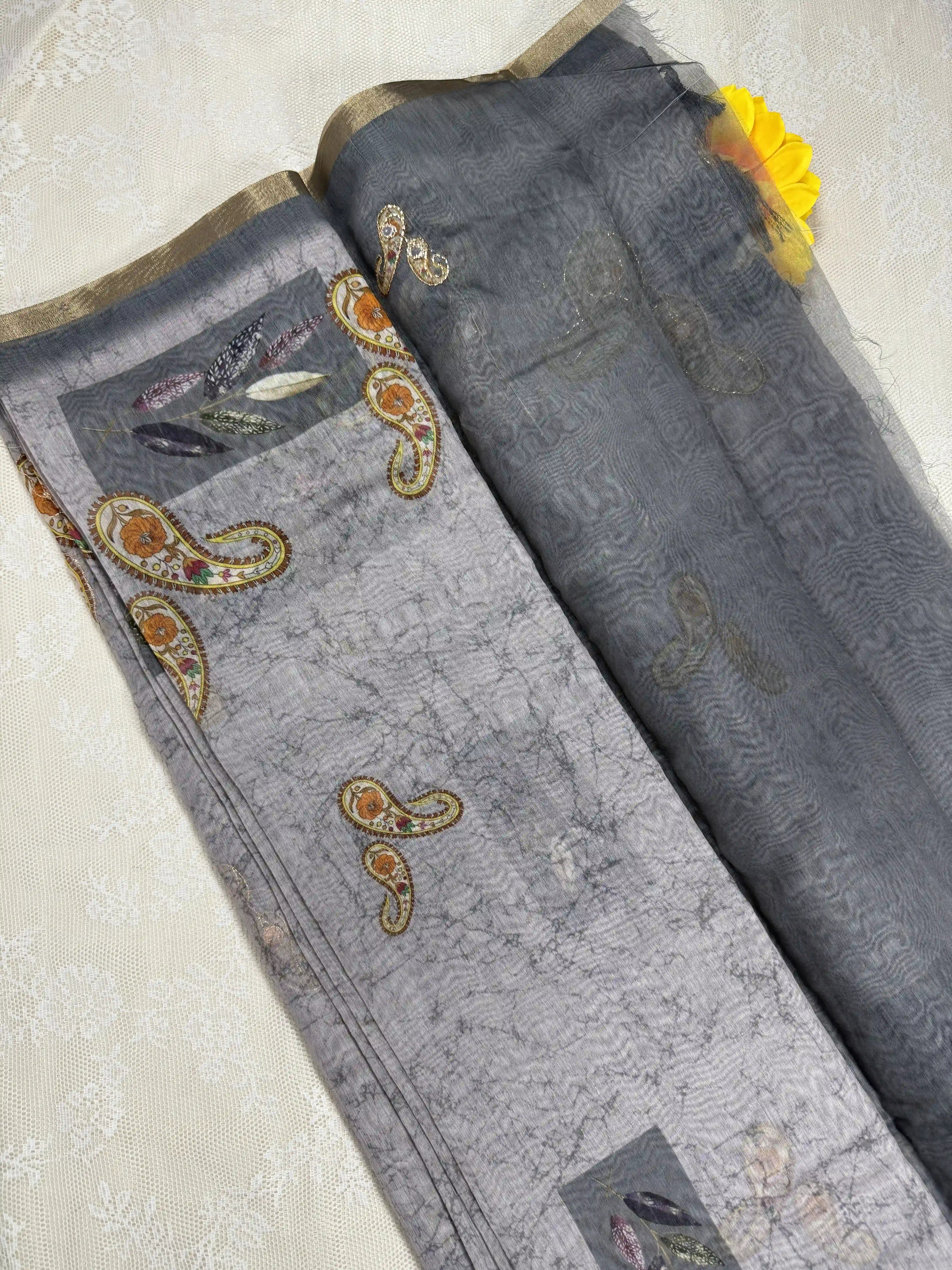 Metallic Grey Silk Cotton Saree with Printed Leaves and Mango Motifs Bordered with Sequence Zari work and Mirror Work