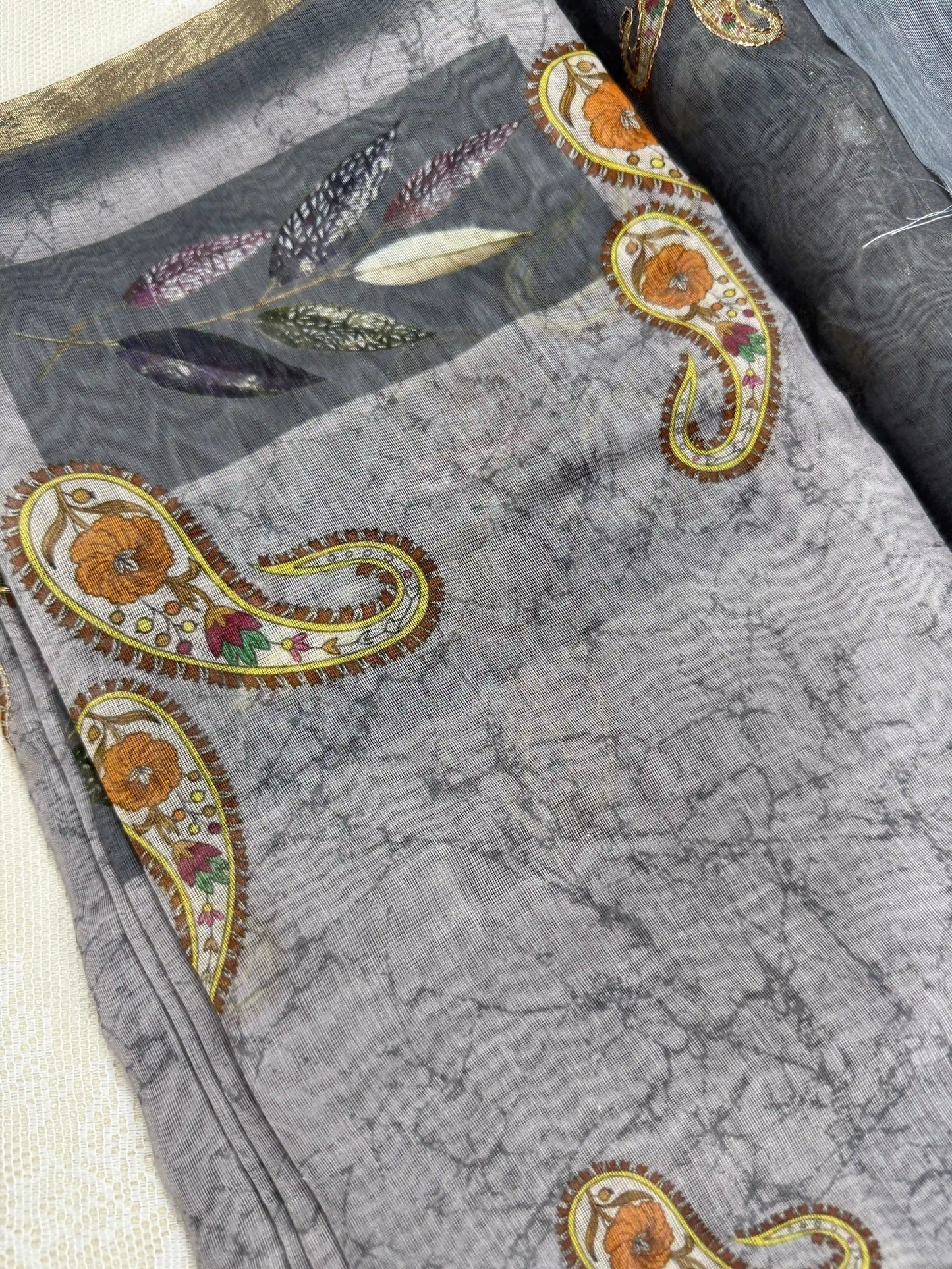 Metallic Grey Silk Cotton Saree with Printed Leaves and Mango Motifs Bordered with Sequence Zari work and Mirror Work