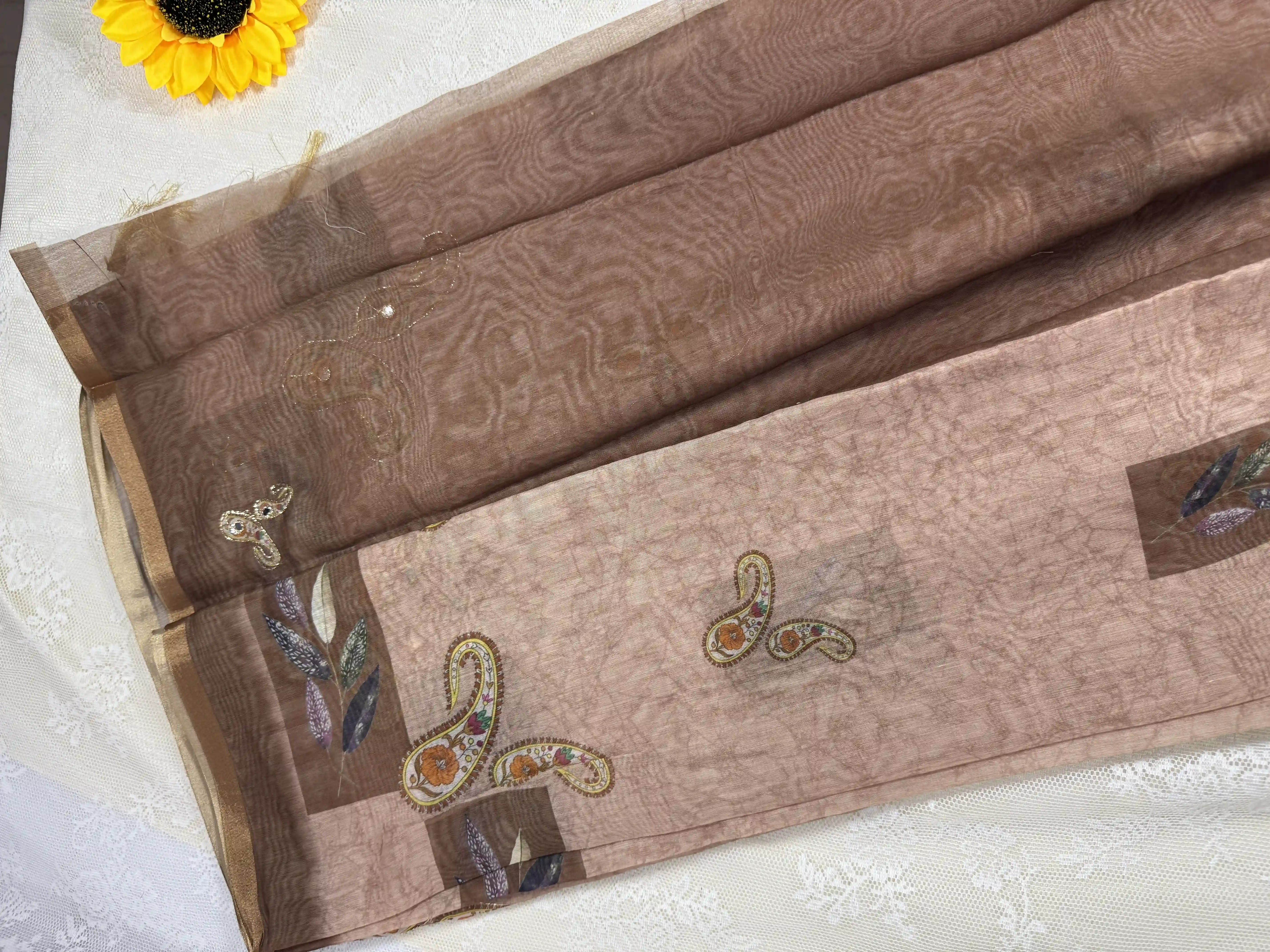 Metallic Brown Silk Cotton Saree with Printed Leaves and Mango Motifs Bordered with Sequence Zari work and Mirror Work