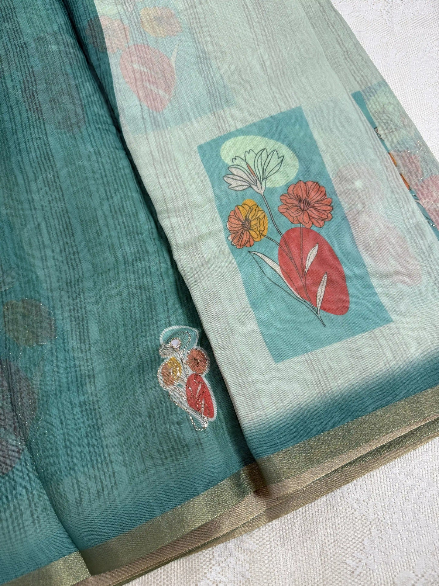 Candy Green Silk Cotton Saree with Printed Floral Motifs Bordered with Sequence Zari work and Mirror Work