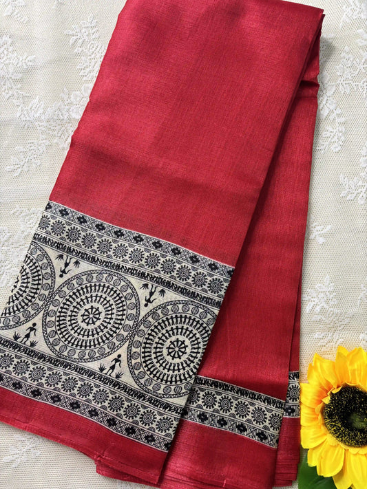 Red plain body khadi silk saree with warli print border and pallu