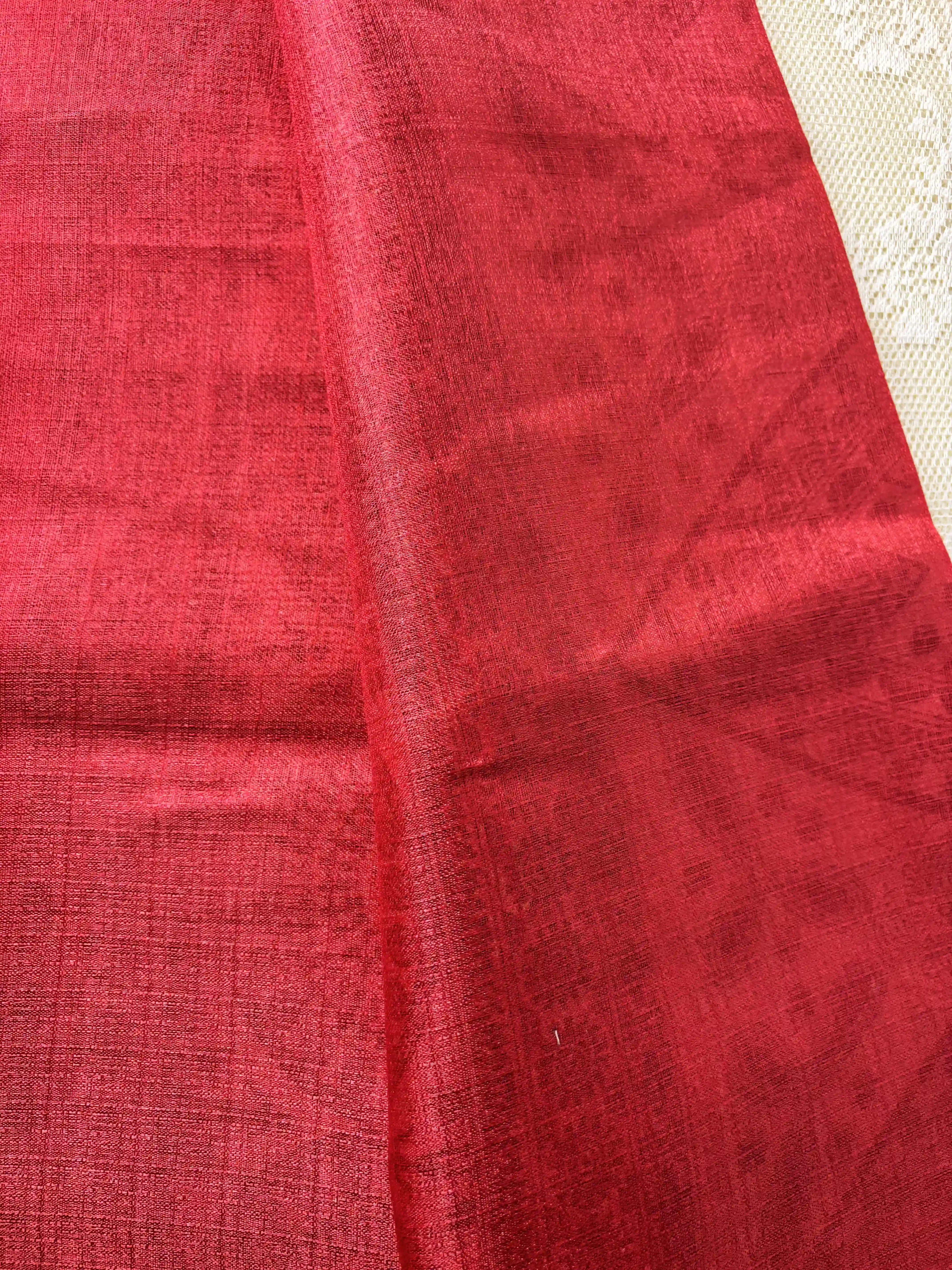 Red plain body khadi silk saree with warli print border and pallu