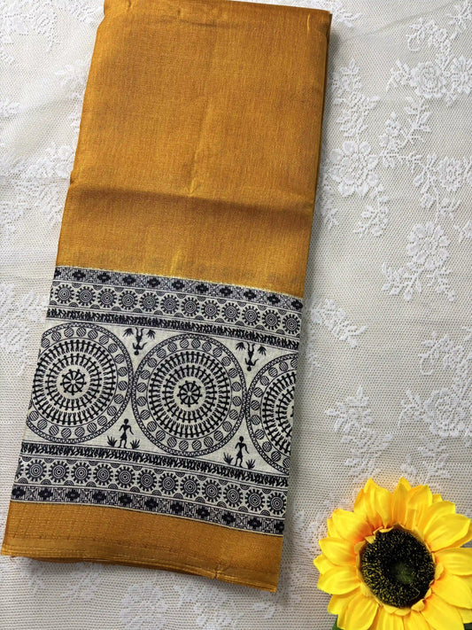 Mustard yellow plain body khadi silk saree with warli print border and pallu