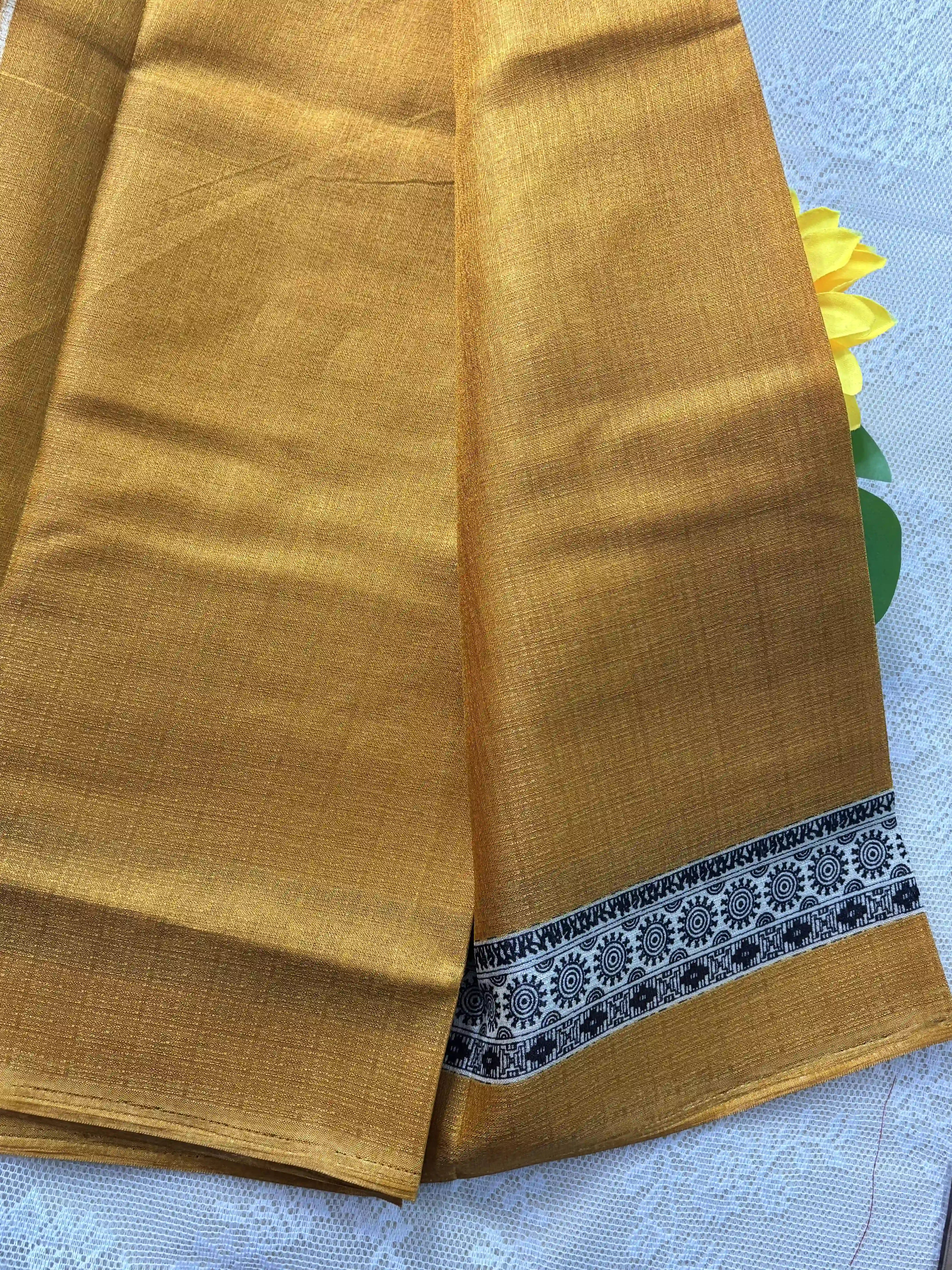 Mustard yellow plain body khadi silk saree with warli print border and pallu