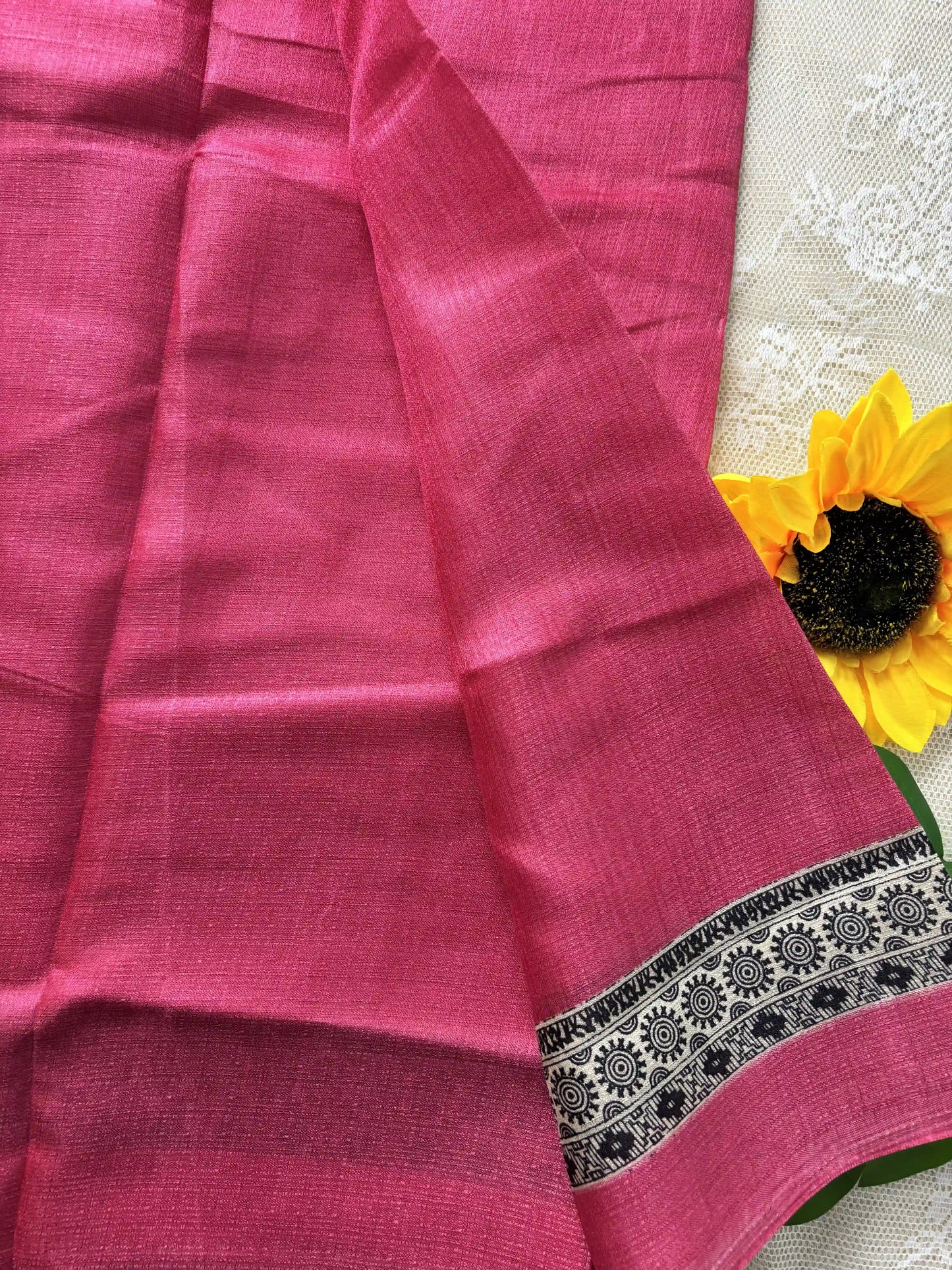 Pink plain body khadi silk saree with warli print border and pallu