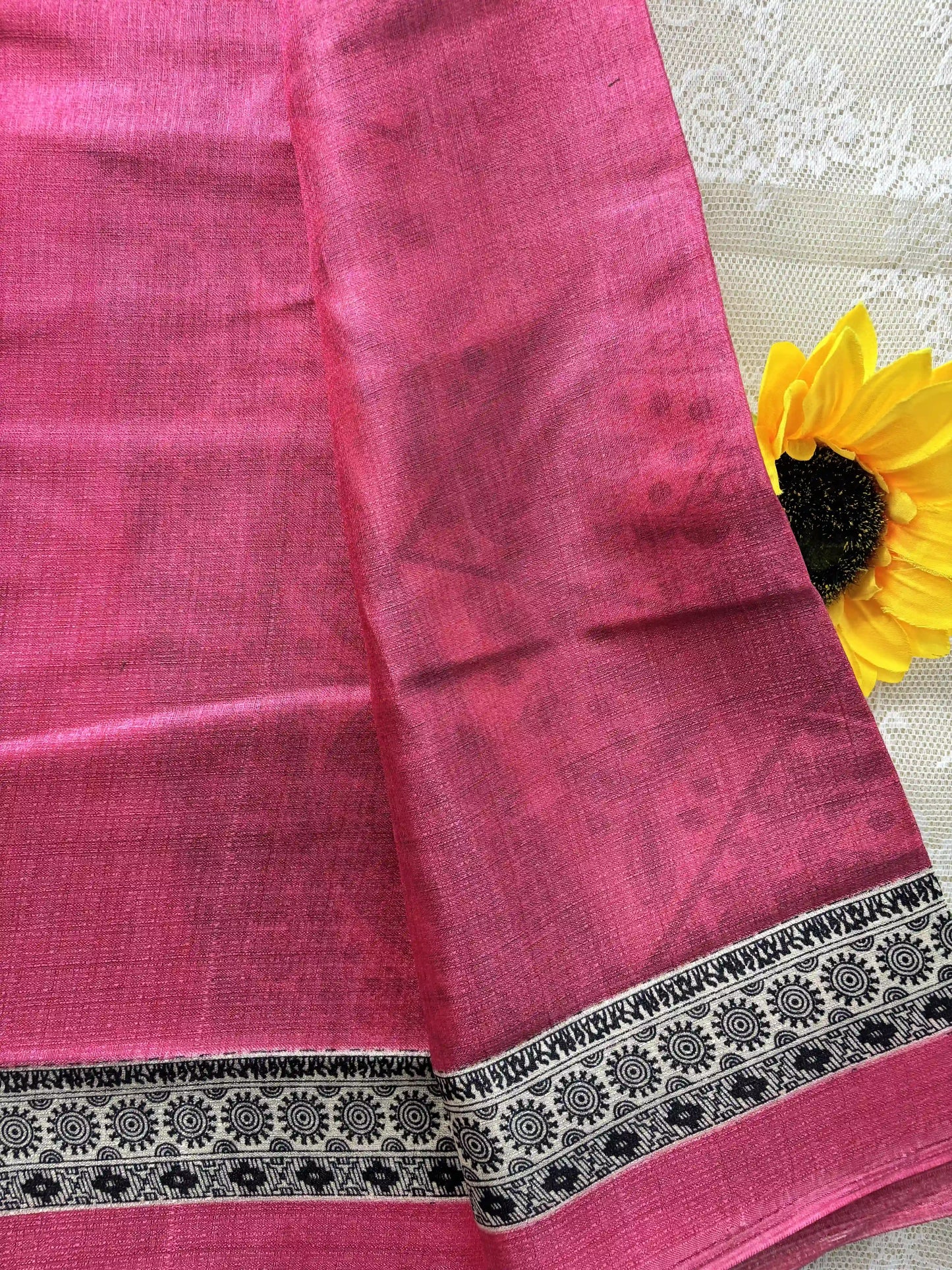 Pink plain body khadi silk saree with warli print border and pallu