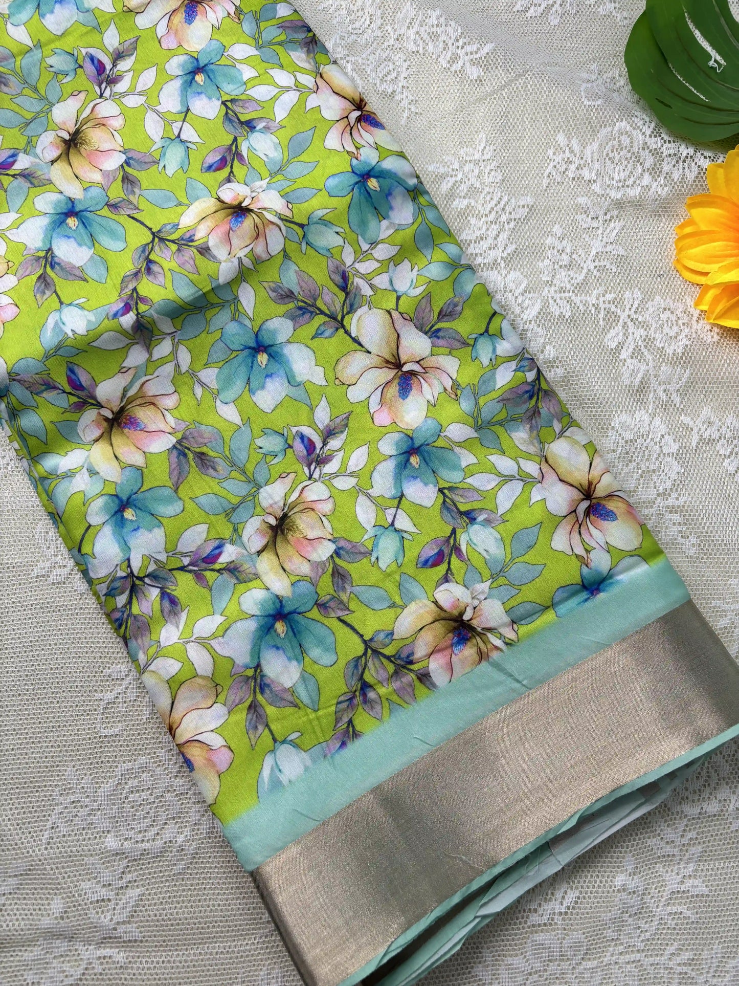 Candy Mint Green and Blue Floral Pint body and Gold Zari Border Saree