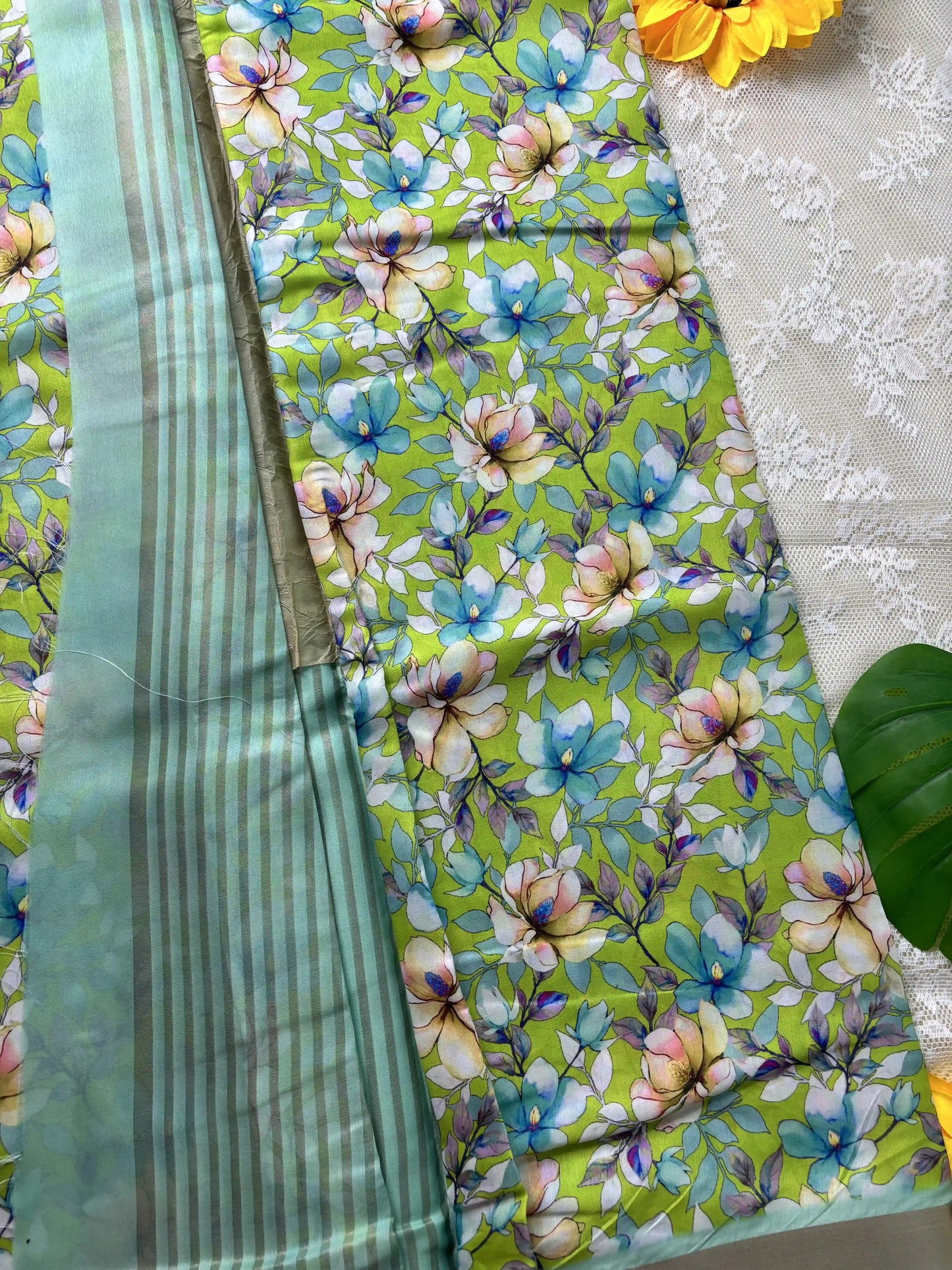 Candy Mint Green and Blue Floral Pint body and Gold Zari Border Saree