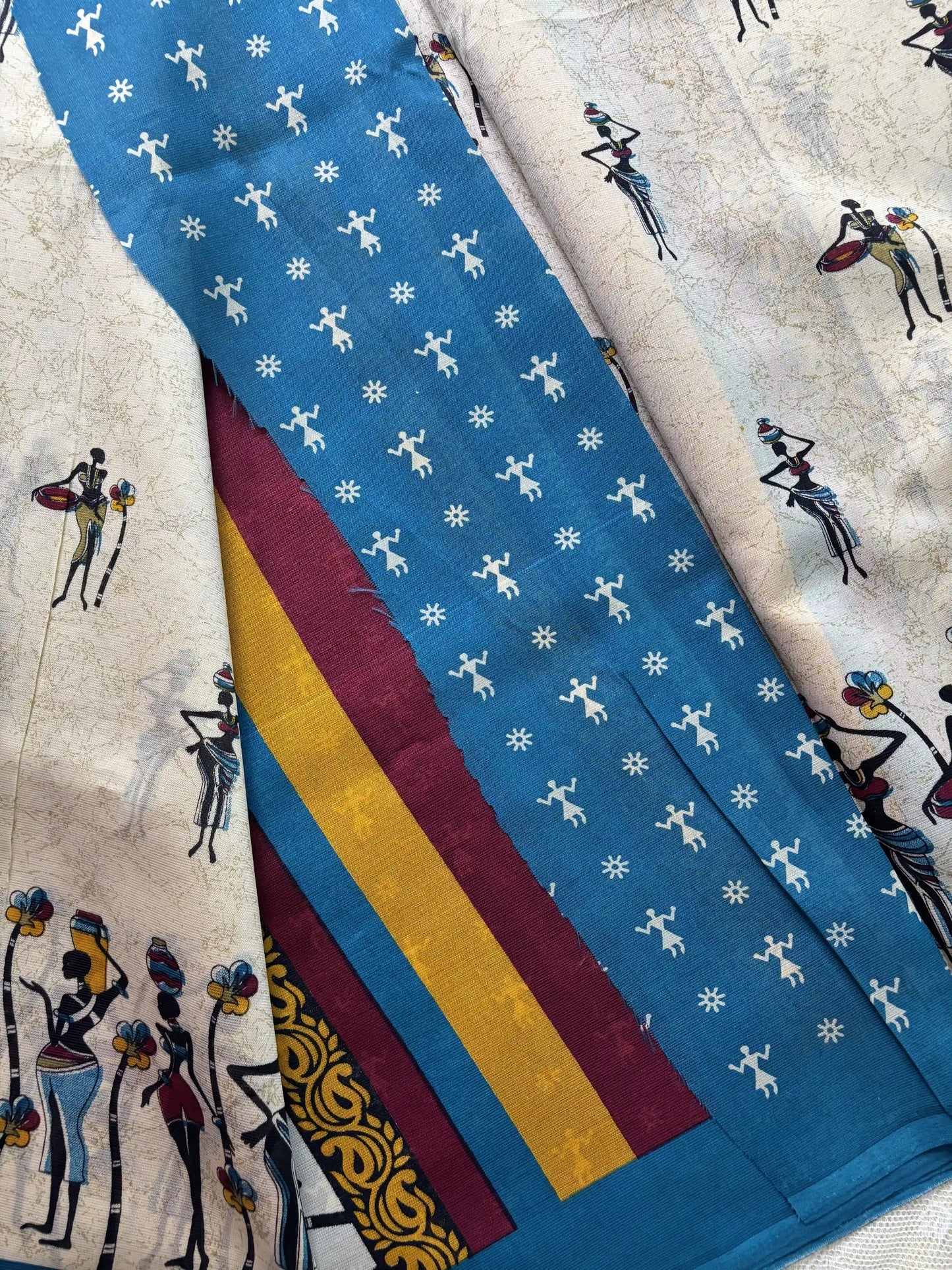 Beige Saree with African Tribal Print and Teal Blue Border Malabar Silk